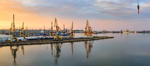 istock Gold sunset over sea port at summer 996836410