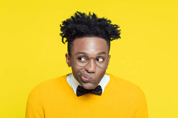 istock Funny portrait of nerdy young man making decision 996839124