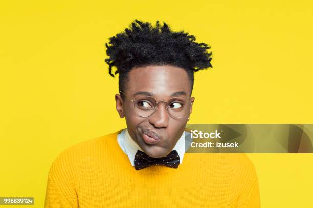 Funny Portrait Of Nerdy Young Man Making Decision Stock Photo - Download Image Now - Asking, Humor, Men