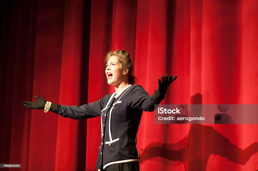actress acting on stage Theatrical Performance Stock Photo