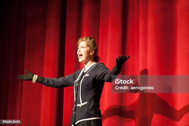 Actress Acting On Stage Stock Photo - Download Image Now - Theatrical Performance, Stage Theater, Stage - Performance Space