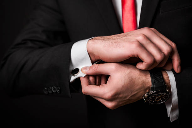 istock Businessman Fixing Cuff links 996843662