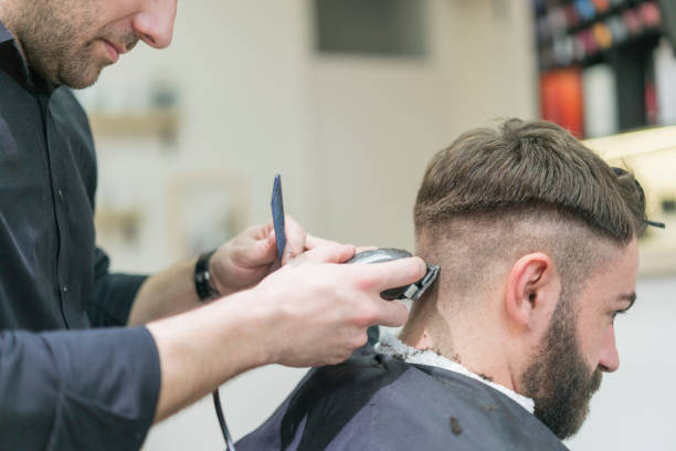 istock Making a hipster haircut 996843712