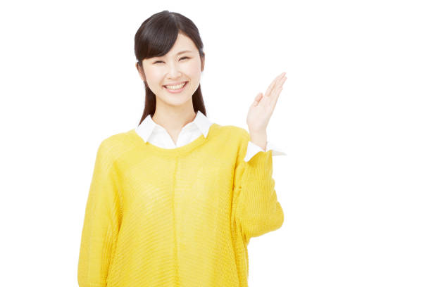 istock Asian woman pointing side 996844354
