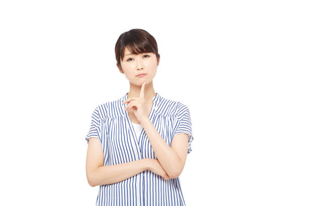 istock thinking Asian woman 996846500