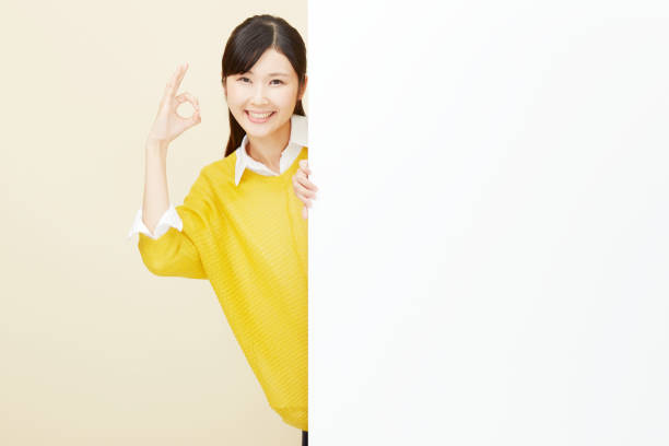 istock Asian woman OK gesture 996846706