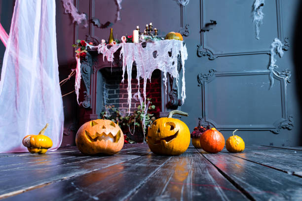 istock Halloween pumpkin heads jack lantern on dark wooden background, 996848384