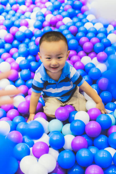 istock Asian boy play on the indoor playground 996854112