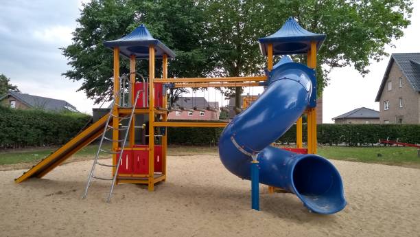 istock Colorful kids playground in a park 996855658