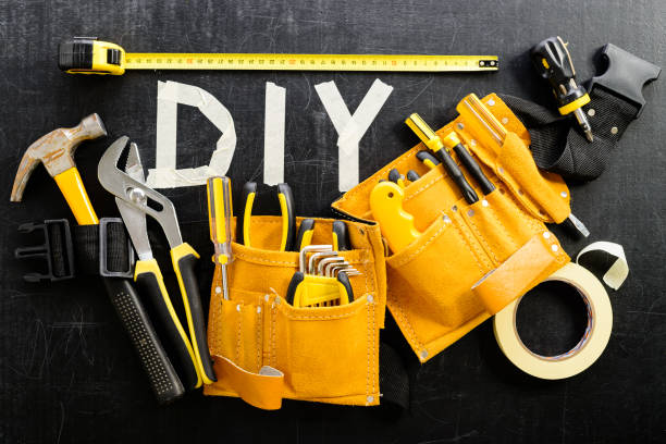 istock top view close-up of tool belt with construction tools and word 996859996