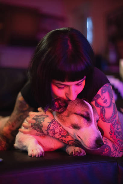 istock Beautiful young woman with dog 996860254