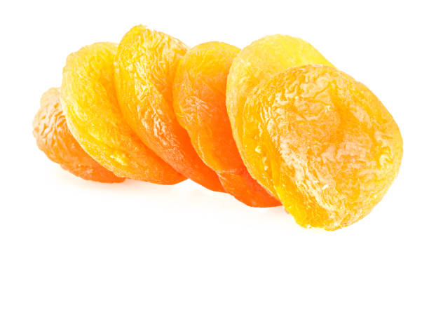 istock Dried apricots isolated on white background 996861140