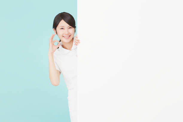 istock Asian woman OK gesture 996871692