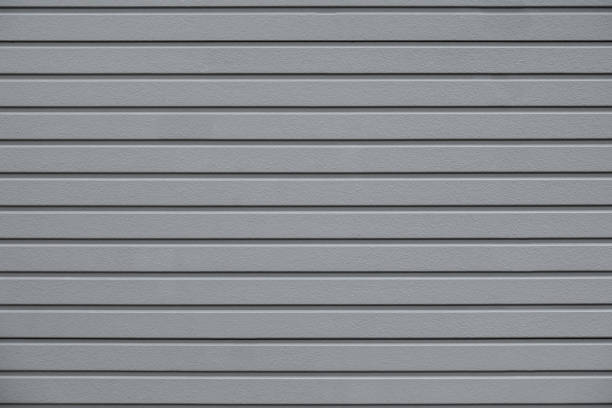 istock Gray store retail metal gate wall closed. 996872040