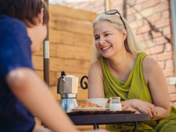 istock Patio time with moter and son 996887978