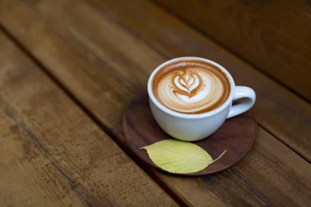 istock Cup of cappuccino on the wood background 996888126