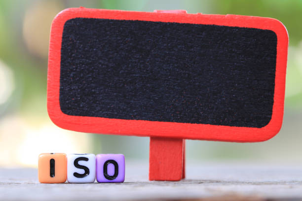 istock Blank wooden sign and plastic text box of ISO. 996894760
