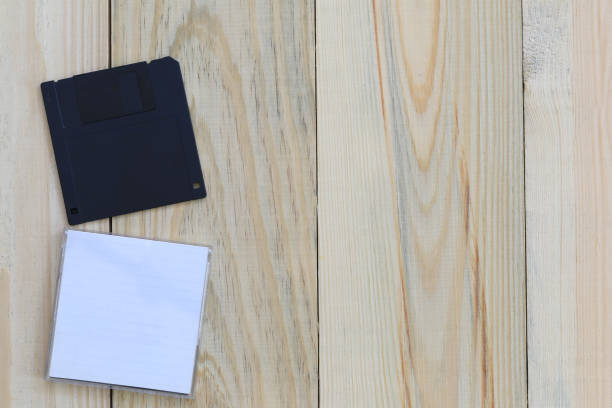 istock Floppy Disk on wooden floor background. 996897674