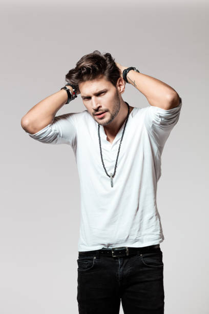istock Handsome male model posing casuals 996909208
