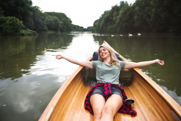 istock Woman in canoe 996909242
