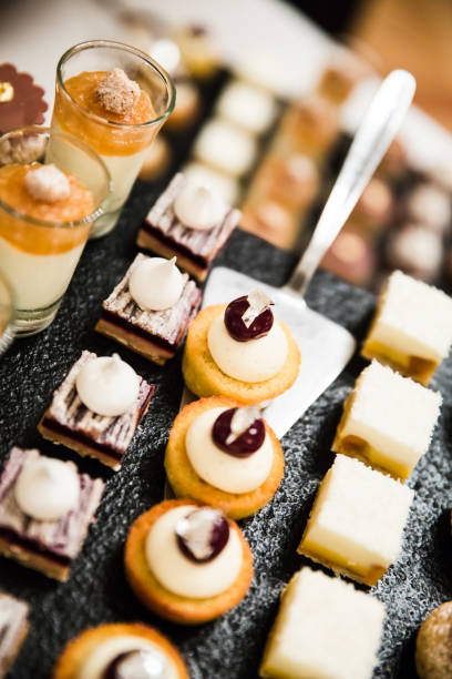 istock Gold and Silver Foiled Wedding Desserts and Mousses 996916758