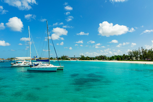 The sunny tropical Caribbean island of Barbados with blue water and yachts