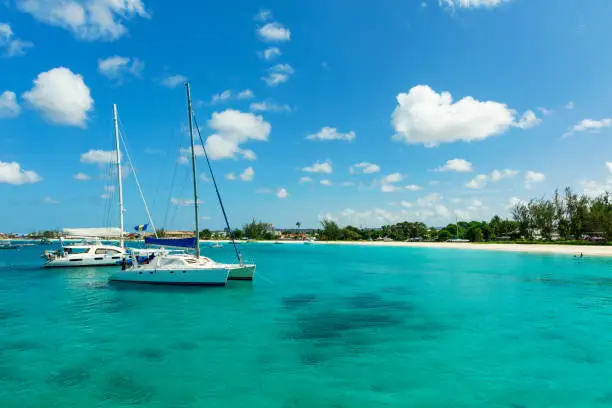The sunny tropical Caribbean island of Barbados with blue water and yachts
