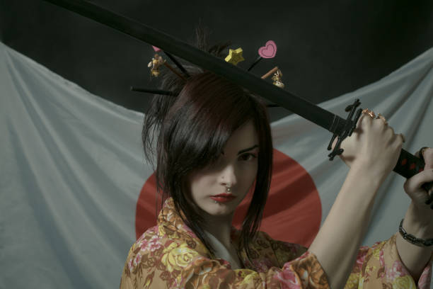 istock Cute asian girl with katana 996928788