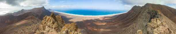 istock Amazing mountain and ocean top view panorama 996940114