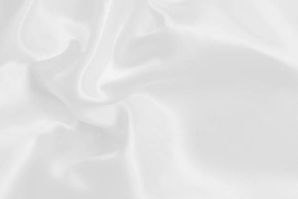 istock White fabric texture for background and design, beautiful pattern of silk or linen. 996952062