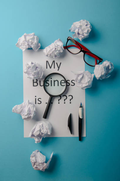 istock Business word with business document paper on blue background 996952954