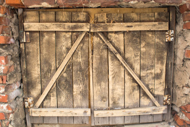 istock Wooden closed window with shutters 996953026