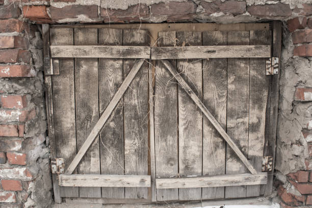 istock Wooden closed window with shutters 996953792