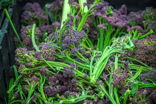 Fresh purple sprouting broccoli on display at Broadway market, a street market in Hackney, East London