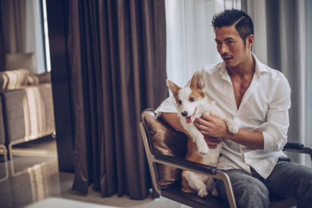 istock Gentleman and pet relaxing 996975656