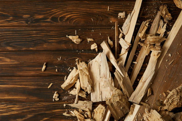 istock elevated view of wooden chips and pieces on brown tabletop 996975896