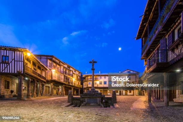 Main Square With A Commemorative Cross At Sunrise At Snowy Day Stock Photo - Download Image Now