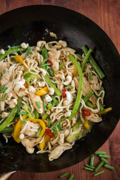 istock Chicken, vegetable and cashew noodle 996990540