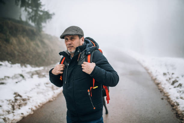istock Senior guy on hiking adventure 997008240