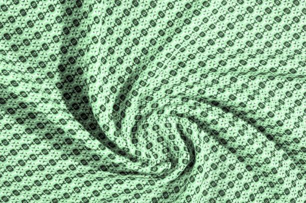 pano de algodão verde, com um padrão de círculos. retrô no design, este algodão estiramento geométrica verde-oliva sateen é perfeito para os anos 70! - lime green pleated pattern green - fotografias e filmes do acervo