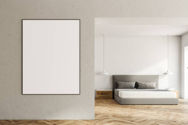 istock White bedroom interior, poster on the wall 997017692