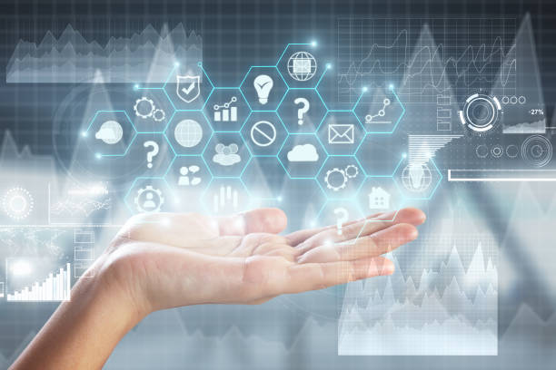 istock Hand holding business hologram 997019628