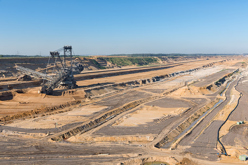Brown coal open pit landscape with enormous digging excavator in Hambach mine Germany, This machine is the biggest vehicle in the world