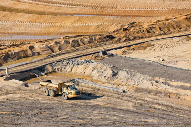 istock Tipping trailer in brown coal open pit landscape in Germany, 997031208