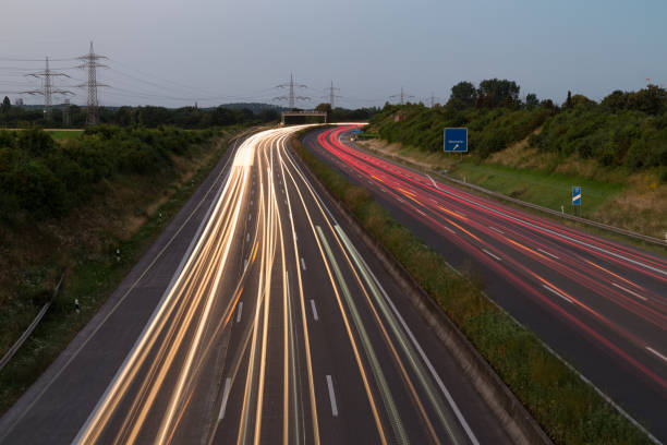 istock Long exposure sunset over German highway near Cologne, Germany 997031306