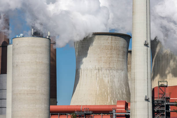 istock Cooling towers and smokestacks coal fired power plant in Germany 997033226