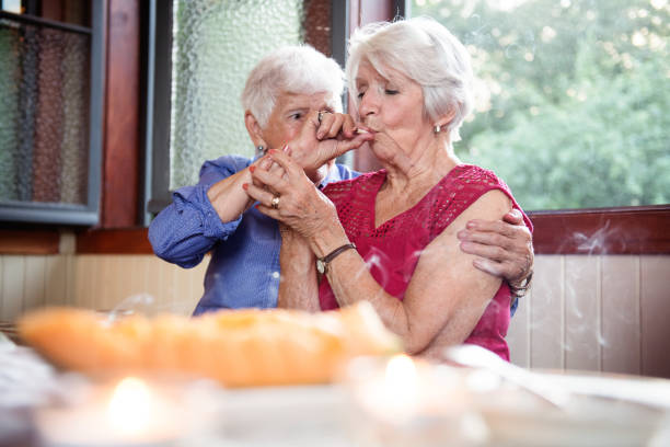 istock Old good friends having a blast, smoking marijuana 997049594