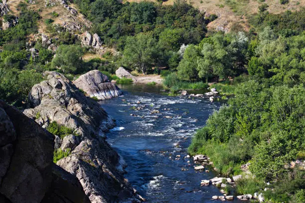 Photo of Southern Bug river landscape with famous rapid Red Gate or Integral in Migeya, Ukraine.