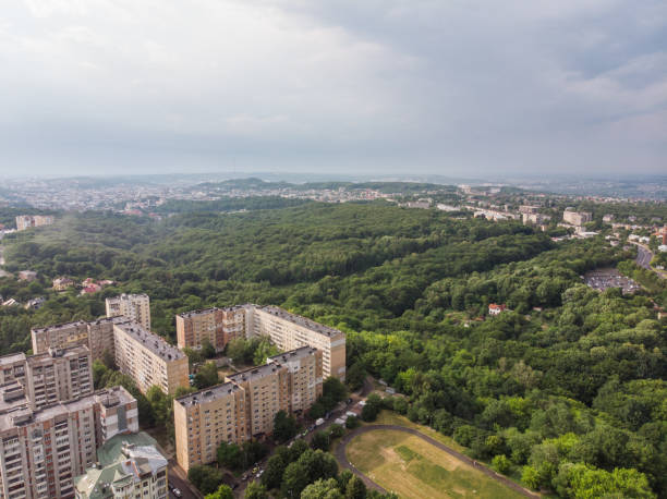 istock overcast weather. rain is coming above city 997075658