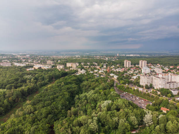 istock overcast weather. rain is coming above city 997075980